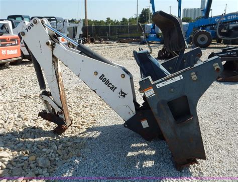 bobcat skid steer backhoe attachments|bobcat 709 backhoe attachment price.